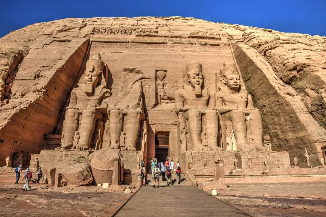The four colossal statues of Ramses II at the entrance to the Great Temple of Abu Simbel, Egypt