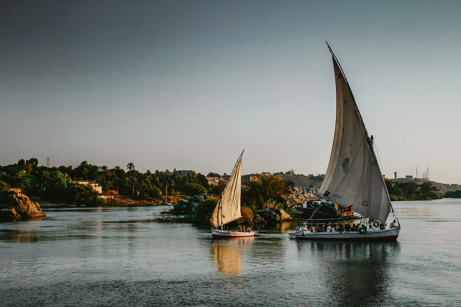 Traditional felucca sailing boats on the Nile at Aswan, Egypt